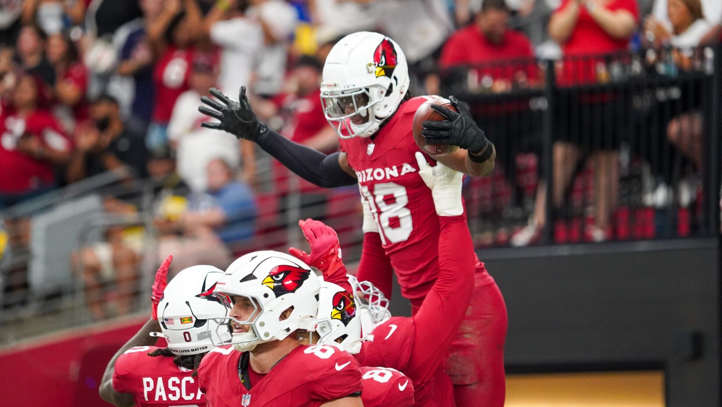 Arizona Cardinals WR Marvin Harrison Jr. celebrates after scoring his first TD...