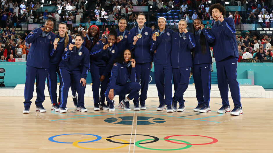 Members of Gold medal winning Team United States pose for a photoduring the Women's basketball meda...